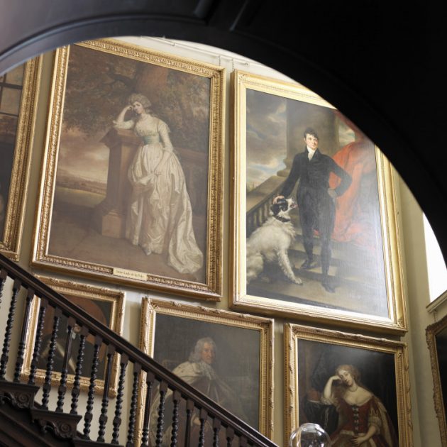 Portrait paintings on the Staircase at Antony, Cornwall © National Trust Images/Cristian Barnett