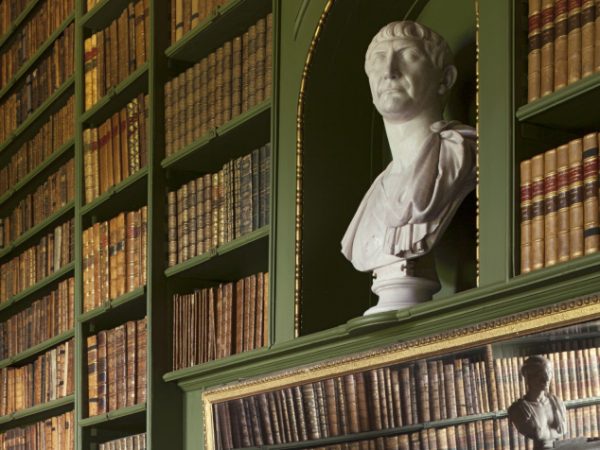 Bust of Trajan, Emperor of Rome, in an arched niche surrounded by bookshelves in the Study at Belton House. By sculptor Joseph Nollekens (1737-1823), Carrerra marble. Belton House, Lincolnshire © National Trust Images/Dennis Gilbert