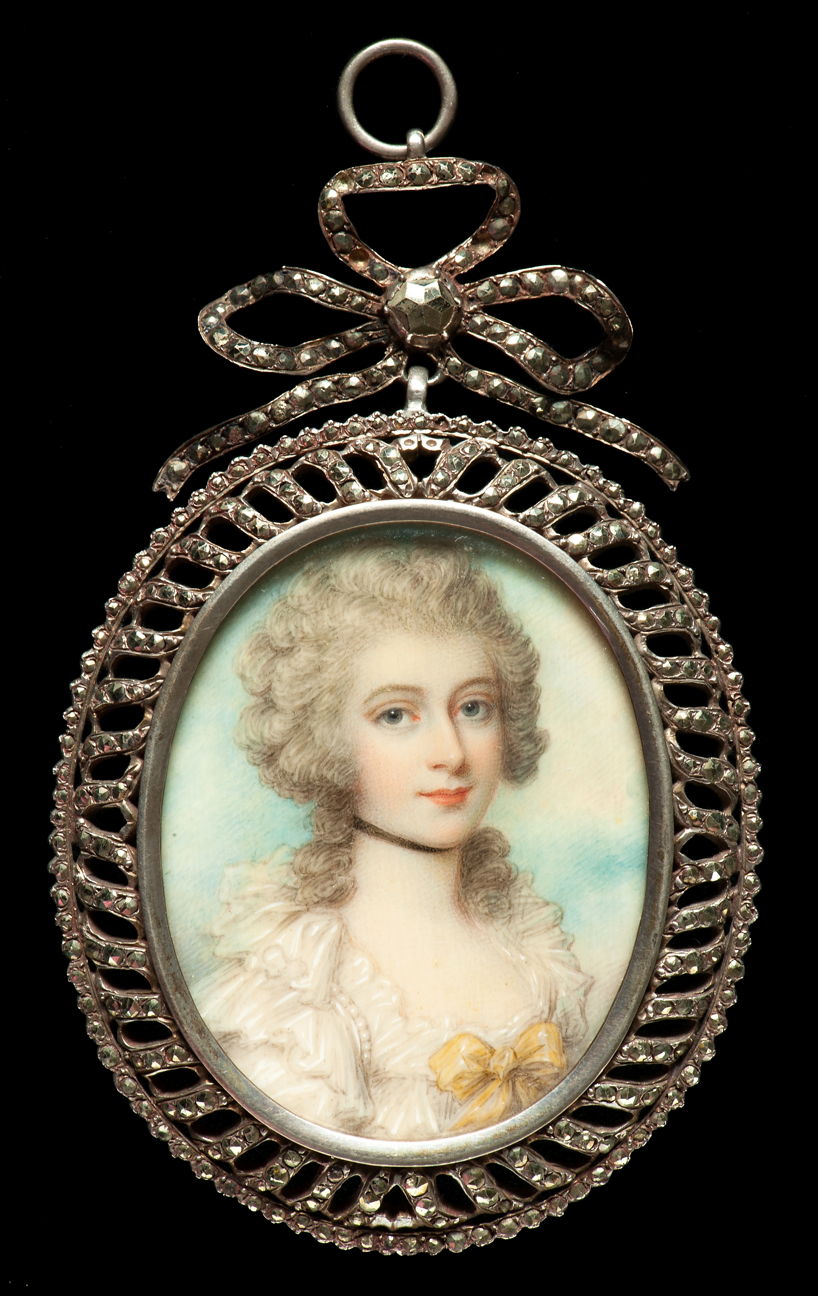 Mrs Townley, attributed to Richard Cosway (1742 -1821), about 1800. Watercolour on ivory; elaborate memorial verso in hair, pearls and sepia; cut-steel frame © Private collection